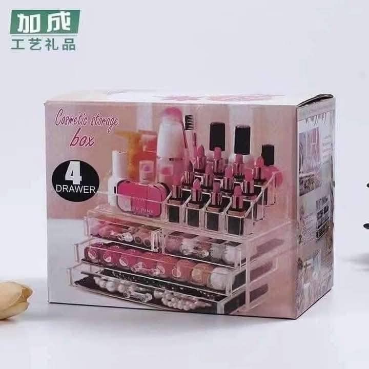 Acrylic Cosmetic Storage Box (Category: Makeup) located in Manila. Submitted by lyfrancois14 (Listing ID 1398715506, Image 1). Description: - Clear acrylic cosmetic storage box - Features four drawers - Ideal for organizing makeup, skincare, and accessories - Multiple compartments for various beauty essentials - Perfect for lipsticks, nail polish, etc. - Space-saving solution for vanity or bathroom.