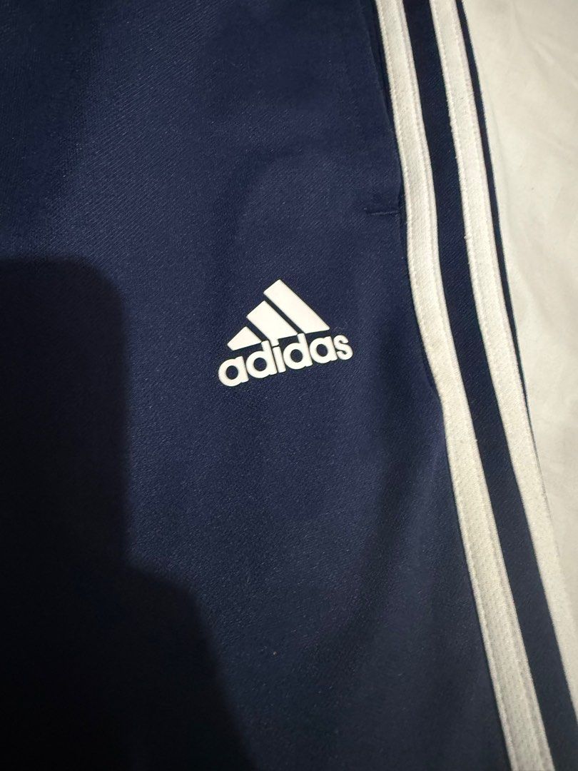 Adidas Track Pants 3 Lines (Category: Other Bottoms) located in Caloocan City. Submitted by jayneejeonsmiling (Listing ID 1398758251, Image 2). Description: Navy Blue Large Waist 28-34 inches Length 39” Polyester fabric.