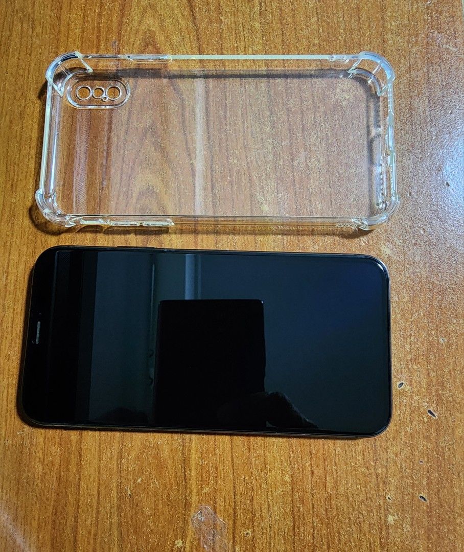 (Category: iPhone X Series) located in Singapore. Submitted by goldpumpkin (Listing ID 1398768510, Image 3). Description: - Comes with a clear protective case - Phone has been reset to factory settings -Very minor signs of wear and tear - Charger and cable included - No box available - Face id not working..
