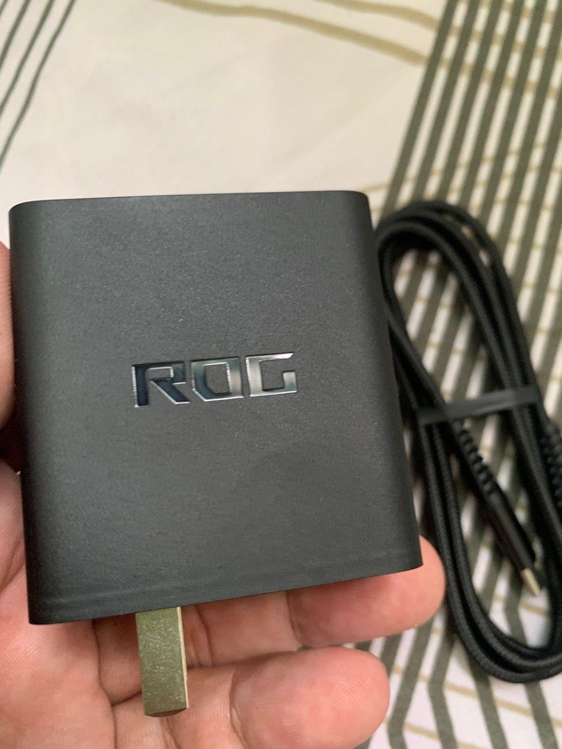 Asus ROG Phone Fast Charging 65W Power Adapter with Cable (Category: Chargers & Cables) located in San Juan City. Submitted by ph_gadgets_hub (Listing ID 1398782195, Image 1). Description: • Asus ROG 65W Type-C PD Charger • For ROG Phone, ROG Ally, etc • Fast Charging • Asus Rog Charger • with 7 days replacement warranty • Brand new ₱2,300 📌 65W Type C Adapter 📌 Type C to C Cable 🚖Same Day Delivery within Metro Manila via lalamove rider 🏍️🏍️