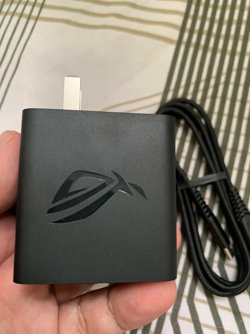Asus ROG Phone Fast Charging 65W Power Adapter with Cable (Category: Chargers & Cables) located in San Juan City. Submitted by ph_gadgets_hub (Listing ID 1398782195, Image 2). Description: • Asus ROG 65W Type-C PD Charger • For ROG Phone, ROG Ally, etc • Fast Charging • Asus Rog Charger • with 7 days replacement warranty • Brand new ₱2,300 📌 65W Type C Adapter 📌 Type C to C Cable 🚖Same Day Delivery within Metro Manila via lalamove rider 🏍️🏍️