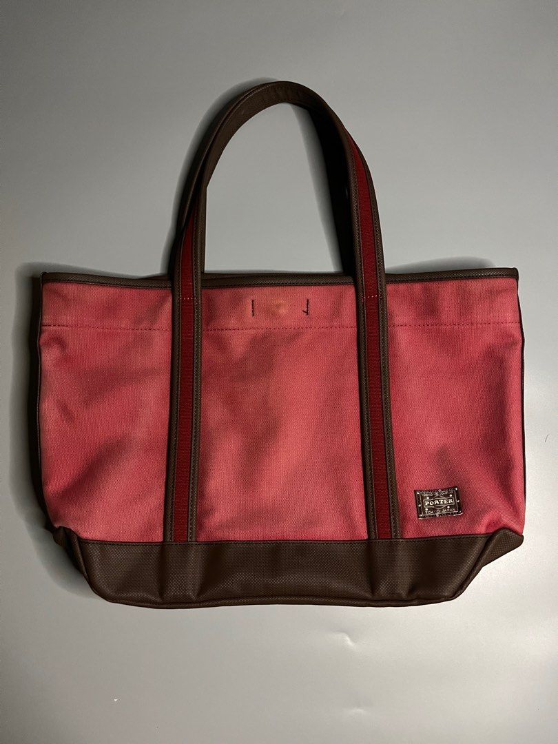 Authentic Porter Red Brown Tote Bag (Category: Luxury Bags & Wallets) located in Cavite. Submitted by playerscollection (Listing ID 1398733419, Image 1). Description: Porter Red Brown Tote Bag Excellent Condition ₱6,580+Shipping Guaranteed Authentic! 💯 Width: 20 inches Length: 13 inches 9/10 condition, in great shape. No scratches in Canvas. 📍Dasmarinas City, Cavite 📲 Unli Vouch 🛵 J&T/ Lalamove / LBC 📮 Dm if Interested.