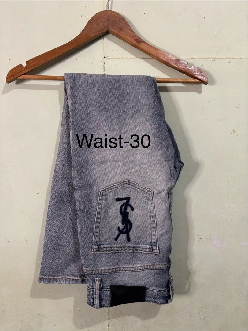 Authentic Saint Laurent Paris Jeans (Category: Luxury Apparel) located in Tayabas. Submitted by mandothriftss (Listing ID 1398729650, Image 1). Description: - Authentic Saint Laurent Paris jeans - Features YSL logo - Waist size: 30 - Made in Italy - Classic denim wash - Stylish and timeless.