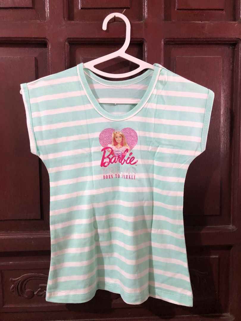 Barbie Striped T-shirt (Category: Babies & Kids Fashion) located in Bacoor. Submitted by declutteredbygem (Listing ID 1398704195, Image 1). Description: .