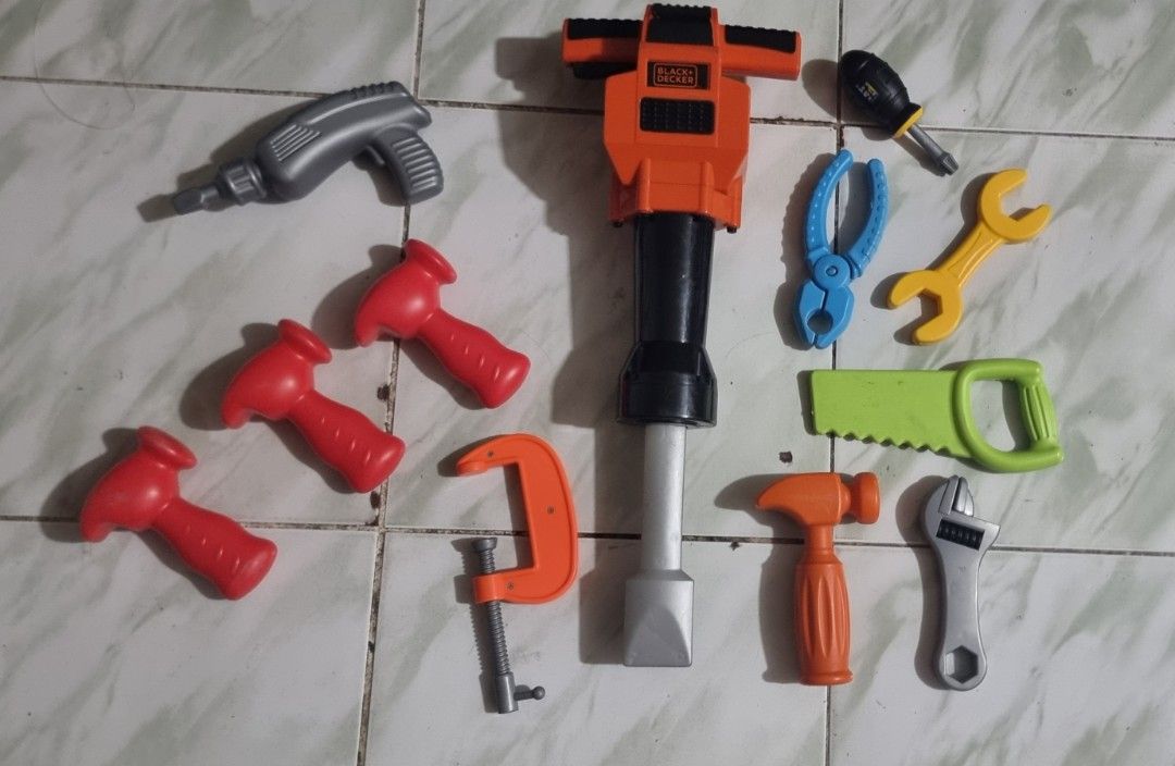 Black & Decker Toy Tool Set (Category: Kids Toys) located in Marikina City. Submitted by andreah_16 (Listing ID 1398754121, Image 2). Description: - Complete toy tool set for kids - Includes drill, jackhammer (Black & Decker), hammers, saw, wrench, pliers, and more - Features various colors: orange, red, gray, yellow, and green - Encourages imaginative play and building activities.
