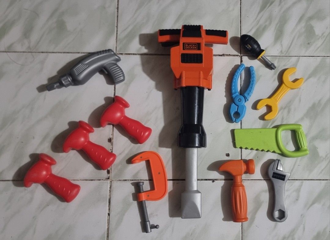 Black & Decker Toy Tool Set (Category: Kids Toys) located in Marikina City. Submitted by andreah_16 (Listing ID 1398754121, Image 3). Description: - Complete toy tool set for kids - Includes drill, jackhammer (Black & Decker), hammers, saw, wrench, pliers, and more - Features various colors: orange, red, gray, yellow, and green - Encourages imaginative play and building activities.