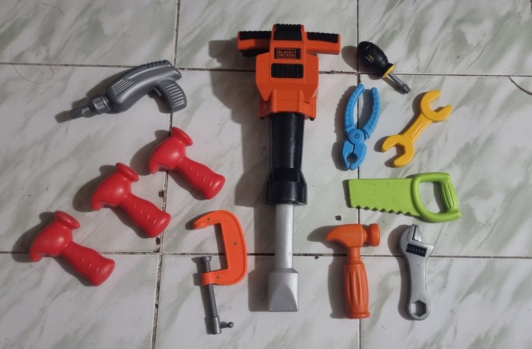 Black & Decker Toy Tool Set (Category: Kids Toys) located in Marikina City. Submitted by andreah_16 (Listing ID 1398754121, Image 1). Description: - Complete toy tool set for kids - Includes drill, jackhammer (Black & Decker), hammers, saw, wrench, pliers, and more - Features various colors: orange, red, gray, yellow, and green - Encourages imaginative play and building activities.