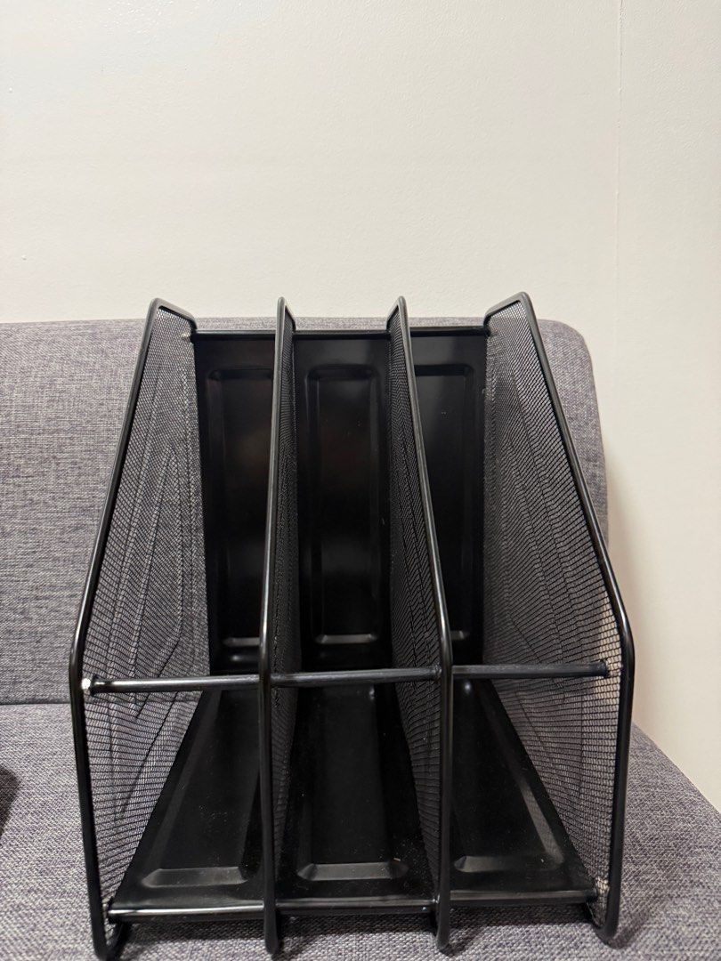 Black Mesh File Organizer (Category: Storage Boxes & Baskets) located in Manila. Submitted by hannabananahhh (Listing ID 1398841150, Image 1). Description: - Black mesh file organizer - Three compartments for organization - Sturdy metal frame - Mesh design for visibility - Ideal for documents, files, and magazines - Designed for desk or shelf use - Stylish and practical workspace solution.