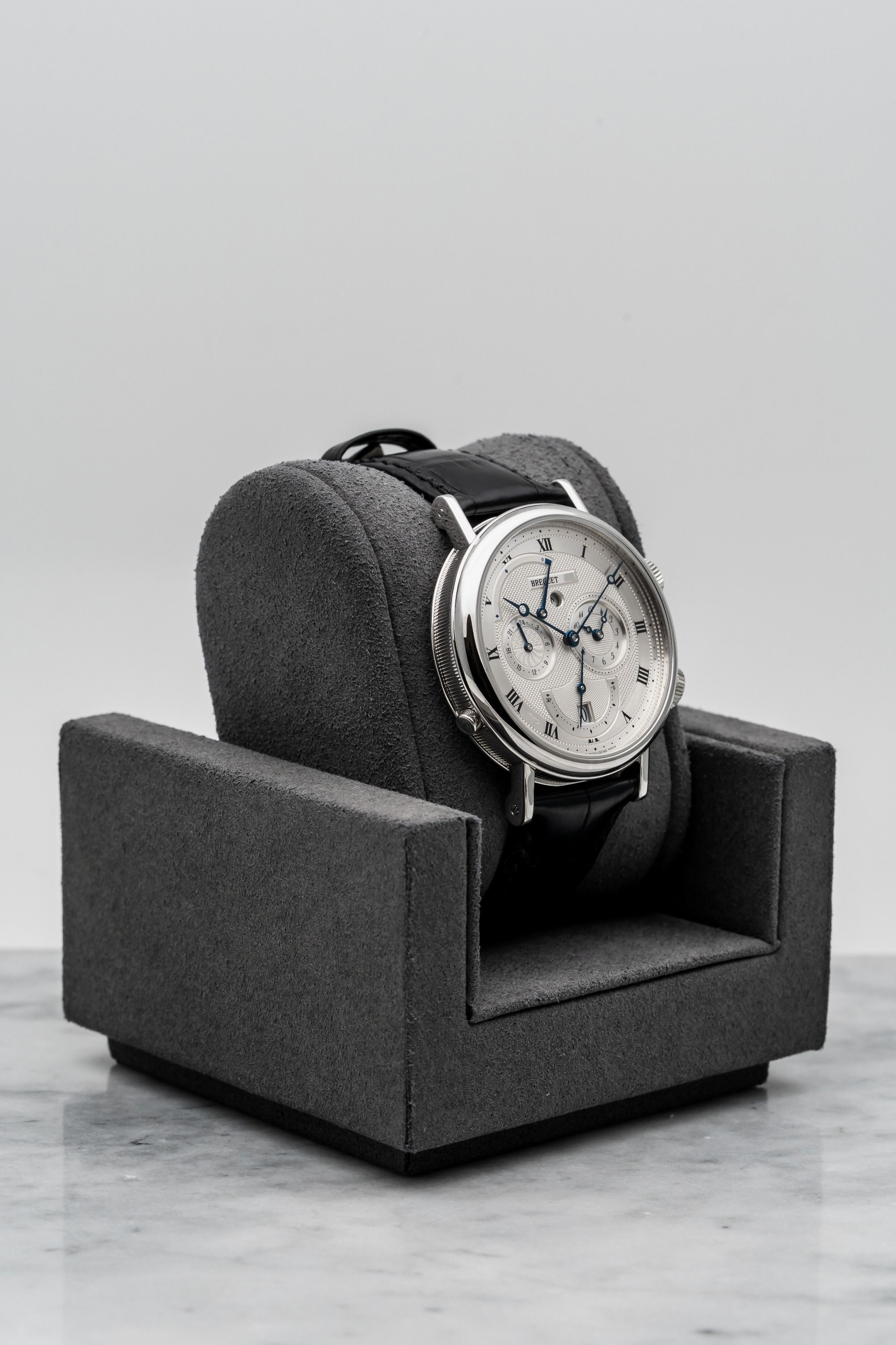 Breguet Classique Le Réveil du Tsar 5707BB/12/9V6 Silver Guilloché • 2017 • 📦 & 📄 (Category: Watches) located in Singapore. Submitted by timetells (Listing ID 1398747056, Image 3). Description: Brand: Breguet Model: Classique Alarm “Le Réveil du Tsar” Reference Number: 5707BB Year: 2017 Case Size: 39 mm Case: 18K White Gold Dial: Silver Guilloché with Roman Numerals, Alarm Function, Dual Time & Date Display Strap: Black Alligator Leather with 1