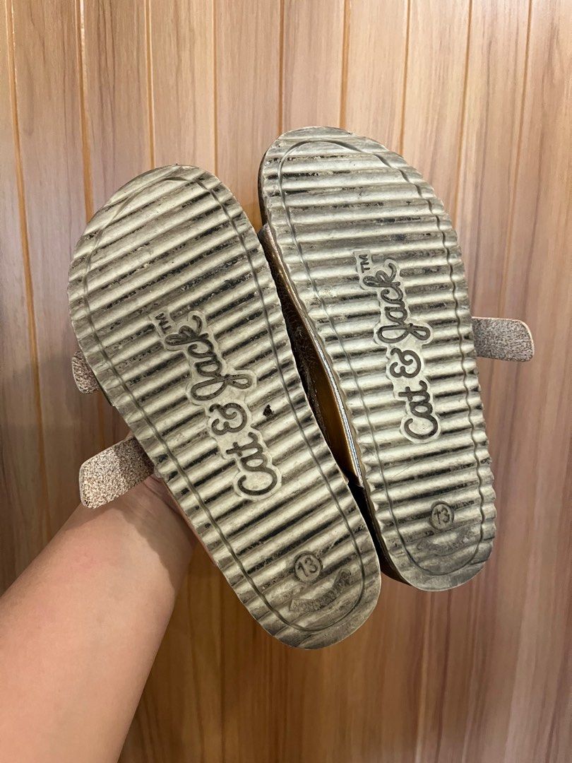 Cat & Jack Gold Sandals Size 13 (Category: Babies & Kids Fashion) located in Paniqui. Submitted by krestetaaa (Listing ID 1398860338, Image 3). Description: - Cat & Jack gold sandals - Size 13 - Two adjustable straps with buckles - Cork-like footbed - Textured soles for grip - Ideal for casual wear.