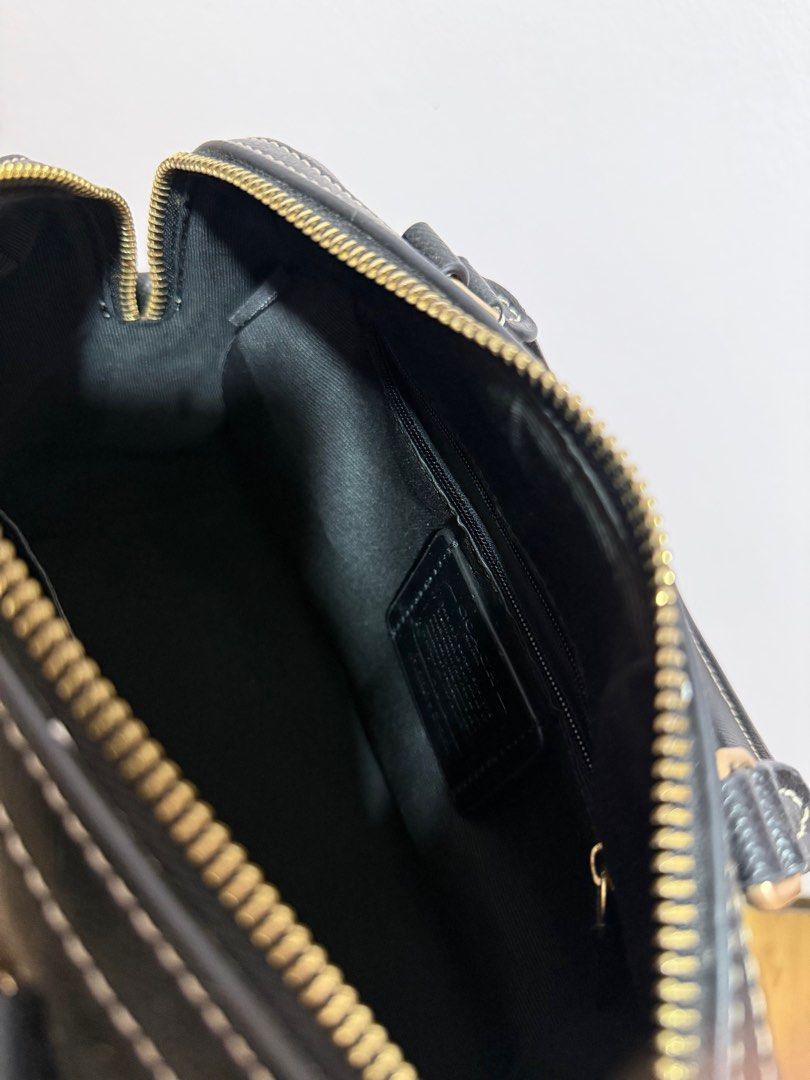 Coach Mini Satchel Bag / Coach Rowan (Category: Luxury Bags & Wallets) located in Manila. Submitted by zapglnwn (Listing ID 1398864410, Image 3). Description: - Black Coach mini satchel - Gold-tone hardware - Top zip closure - Dual top handles - Adjustable, detachable shoulder strap - Coach hang tag - Back zip pocket - Interior slip pocket - Contrasting white stitching not guaranteed authentic, bought in IG for ₱5,000 - used twice only.