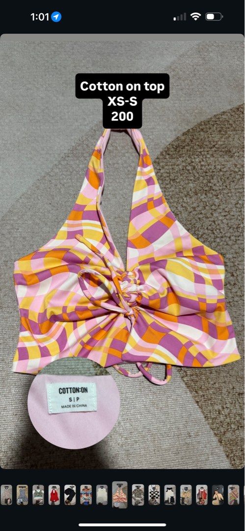 Cotton On Halter Top XS-S (Category: Sleeveless) located in Navotas City. Submitted by prellelovedd (Listing ID 1398768326, Image 1). Description: - Cotton On halter top - Size: XS-S - Features a colorful abstract print - Design: Tie detail at the front - Retro Top - Perfect for a casual look.