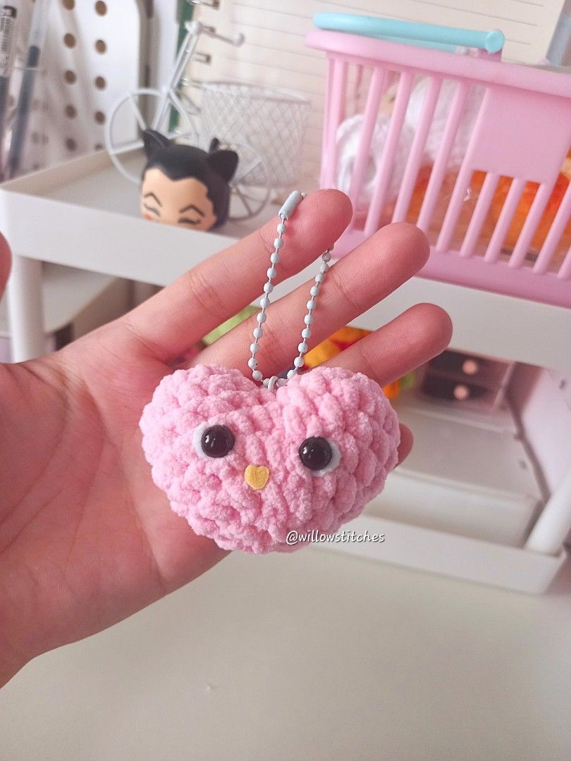 Crocheted Bunny Holding A Pink Heart (Category: Handmade Craft) located in Cavite. Submitted by willowstitches_ (Listing ID 1398755468, Image 2). Description: FREE PINK HEART KEYCHAIN MADE TO ORDER (3-5 woking days) - bunny plushie🐰 (6inches) Materials: Small Mini Chenille Yarn 4.5mm hook 10mm safety eyes For more details visit my other socials: Blue app.: Willow Stitches Clock app.: willow_stitches 📍𝐋𝐨𝐜𝐚𝐭𝐢𝐨𝐧: Naic, Cavite 💰 𝐌𝐎𝐏: GC