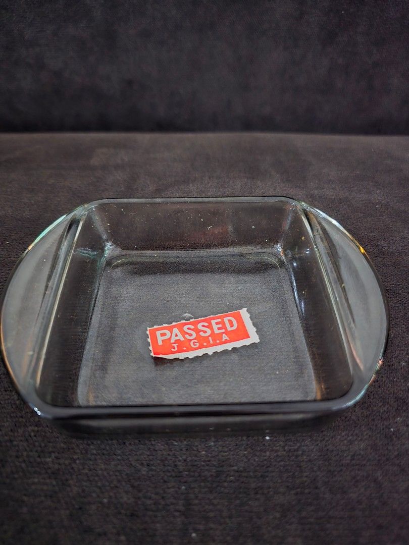 Glass Dish with 'Passed' Sticker (Category: Dinnerware & Cutlery) located in Taguig. Submitted by threadsntable (Listing ID 1398811375, Image 3). Description: - Rectangular glass dishes with rounded corners. - Each dish features a 'PASSED J.G.A' sticker. - Set includes multiple dishes. - Dishes are stored in a cardboard box with dividers..