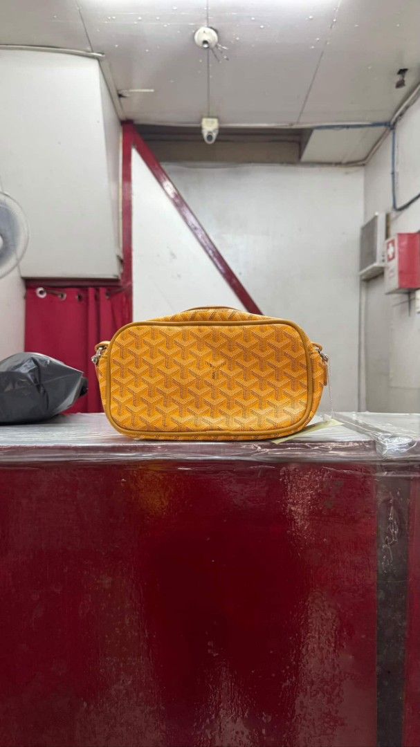 Goyard Capvert Bag Yellow (Category: Luxury Bags & Wallets) located in Quezon City. Submitted by hiroshicut85537 (Listing ID 1398863832, Image 1). Description: - Yellow Goyard CapVert Bag - Features the signature Goyardine pattern - Includes a crossbody strap - with tag - Rectangular shape with top zipper closure - Adjustable strap - Made of durable material +1300 only.