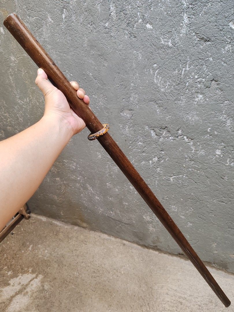 Japanese Wooden Training Sword (Category: Combat Sports) located in Bulacan. Submitted by jbcarmelo (Listing ID 1398858087, Image 2). Description: wooden training sword, which is used in martial arts. It is commonly known as a bokken or bokutō. A bokken is a Japanese wooden sword used for training in kenjutsu and other martial arts. It is typically the same size and shape as a katana, a traditional Japanese sword, but is made of hardwood like red