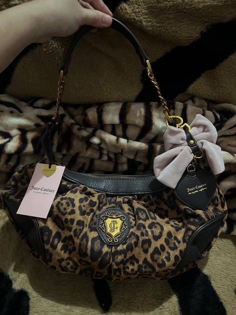 Juicy Couture- Leopard Romance hobo (Category: Luxury Bags & Wallets) located in Manila. Submitted by trinity_86 (Listing ID 1398798322, Image 1). Description: *ON HAND* Authentic Juicy Couture Brand New with tags SERIOUS buyers can dm me for pic & vid Gcash/bank transfer.