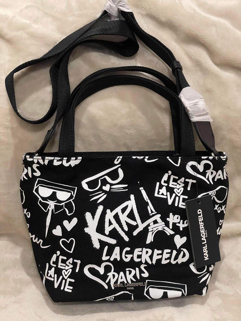 Repriced: Karl Lagerfeld 2way Bag (Category: Cross-body Bags) located in Balamban. Submitted by nitasgoodfinds2 (Listing ID 1398766023, Image 1). Description: Karl Lagerfeld 🇺🇸 Top Zip 2way Crossbody Bag Canvas Dimensions: 11”x8”3.75”.