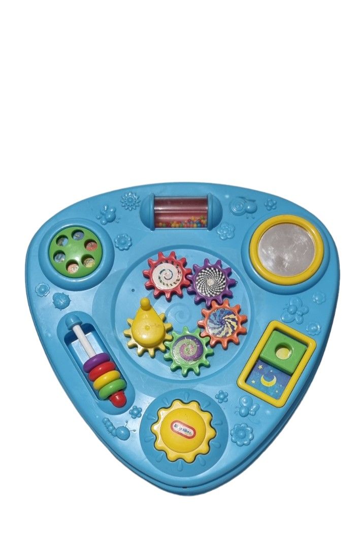 Little Tikes Activity Table (Category: Infant Playtime) located in Marikina City. Submitted by andreah_16 (Listing ID 1398758131, Image 2). Description: - Little Tikes activity table - Designed for toddlers and young children - Features interactive elements: gears, roller, mirror, etc. - Bright blue color - Triangular shape.