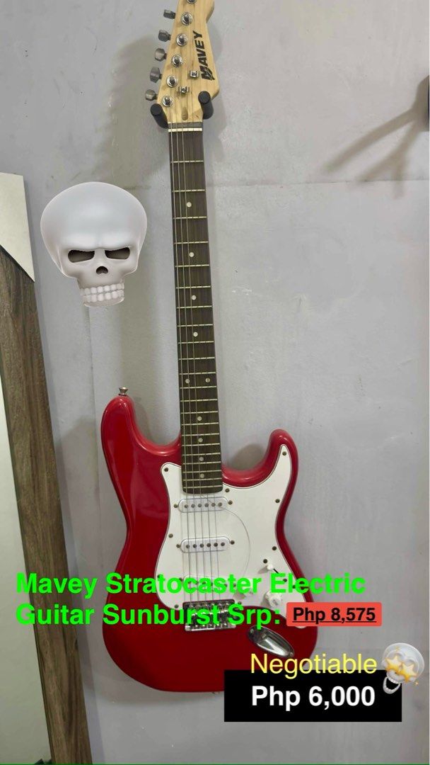 Mavey Stratocaster Electric Guitar Sunburst (Category: Musical Instruments) located in Quezon City. Submitted by mightyriver-93a2 (Listing ID 1398862662, Image 1). Description: - Mavey Stratocaster electric guitar - Stunning sunburst finish - Classic Stratocaster design - Red body with white pickguard - Mavey brand on headstock - Price: Negotiable at Php 6,000.