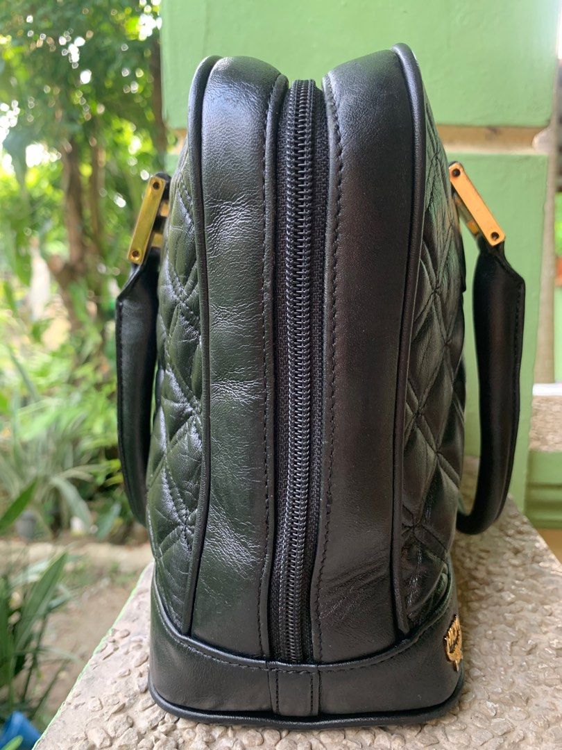 MCM Quilted leather (Category: Luxury Bags & Wallets) located in San Fabian. Submitted by dhangkie86834 (Listing ID 1307323706, Image 3). Description: MCM quilted leather alma style bag Turnable screws, 8/9 leaves Still in good preloved condition Minimal tarnish hardwares but no flaws 11Lx8Hx4.5W.