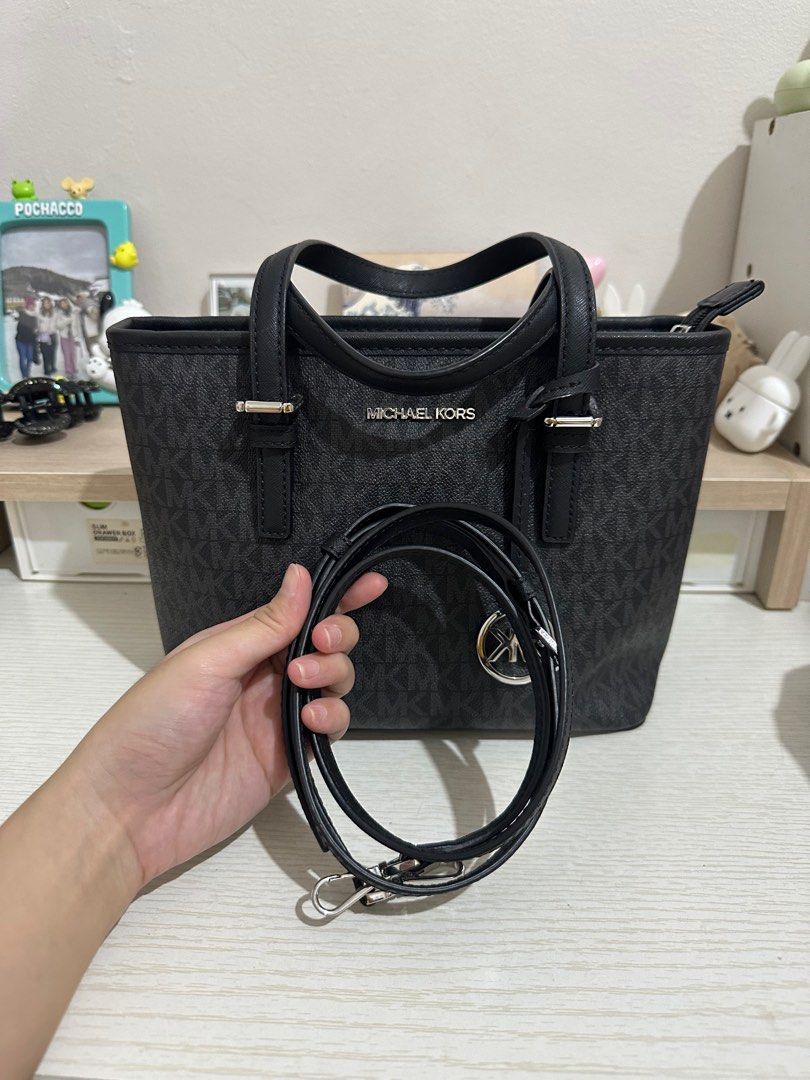 Michael Kors Jet Set Travel Black (Category: Luxury Bags & Wallets) located in Antipolo. Submitted by bhrl__48 (Listing ID 1398751114, Image 2). Description: - used once only - comes with shoulder strap - purchased in the US for $328 (19k pesos) - dimensions in inches: 8.75 length x 7 height x 4 width.