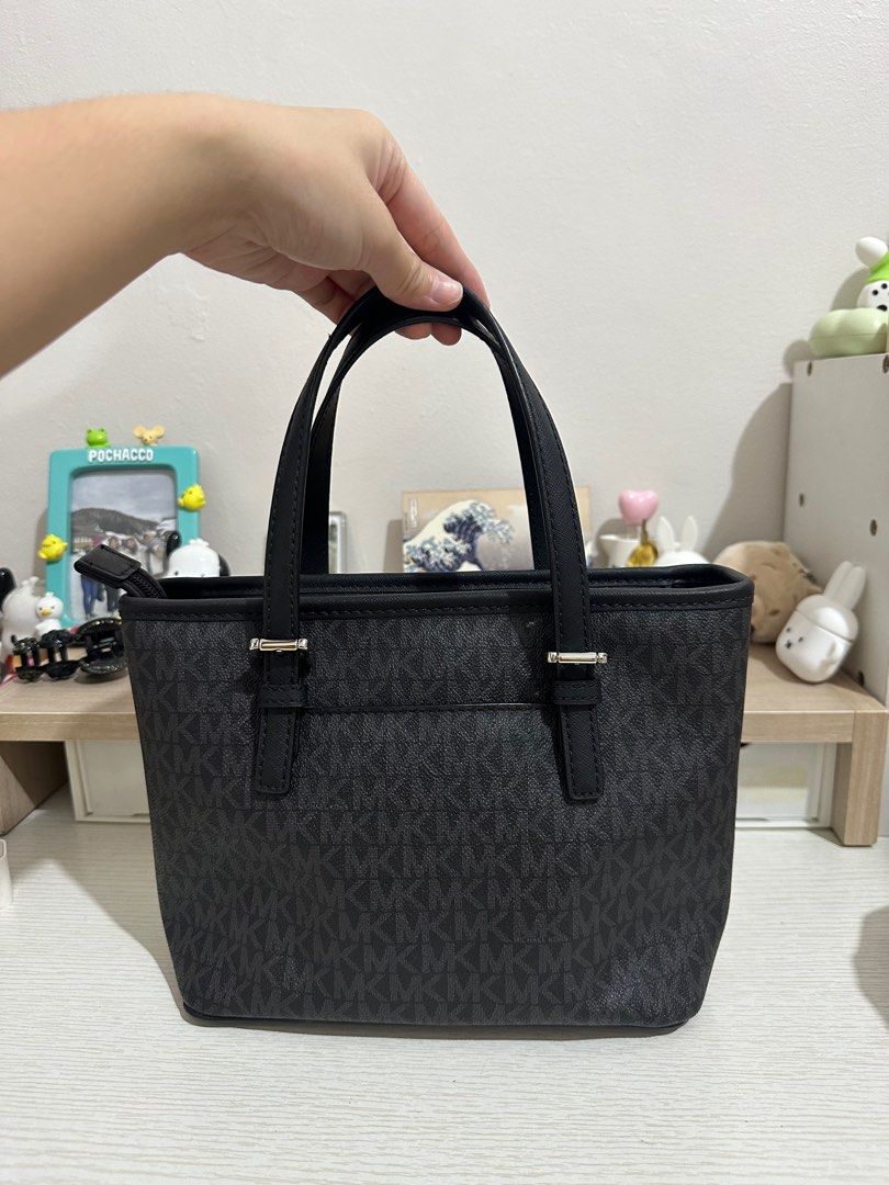 Michael Kors Jet Set Travel Black (Category: Luxury Bags & Wallets) located in Antipolo. Submitted by bhrl__48 (Listing ID 1398751114, Image 3). Description: - used once only - comes with shoulder strap - purchased in the US for $328 (19k pesos) - dimensions in inches: 8.75 length x 7 height x 4 width.