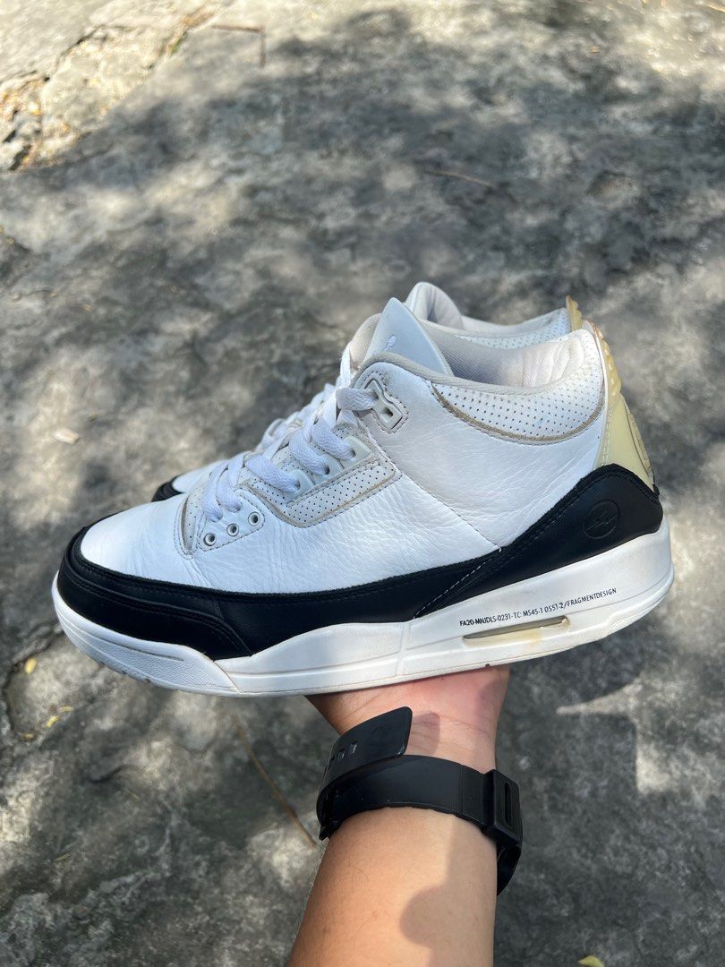Nike Air Jordan Fragment Design (Category: Sneakers) located in Bacolod City. Submitted by kit.duff (Listing ID 1398711701, Image 1). Description: - Nike Air Jordan Fragment Design sneakers - Color: White and Black - Size: US 9.5, EUR 43, UK 8.5 - Production Date: 02/03/2021 - Features Fragment Design logo on the heel.