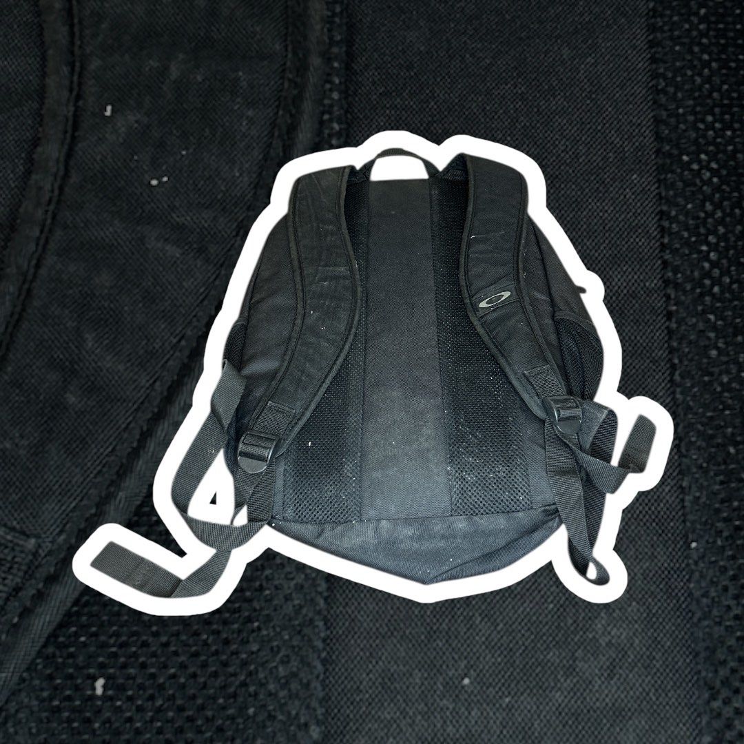 Oakley Black Utility Tactical Backpack / Small Laptop Bag - Durable Design (Category: Backpacks) located in Paranaque City. Submitted by thepopneverstops (Listing ID 1398752239, Image 3). Description: Black utility tactical backpack with durable design. Features multiple compartments including laptop sleeve. Practical for work, travel, or outdoor activities. ❌video ❌when worn pics ❌lowball ❌cod Tags: tactical backpack, utility bag, laptop bag, bl