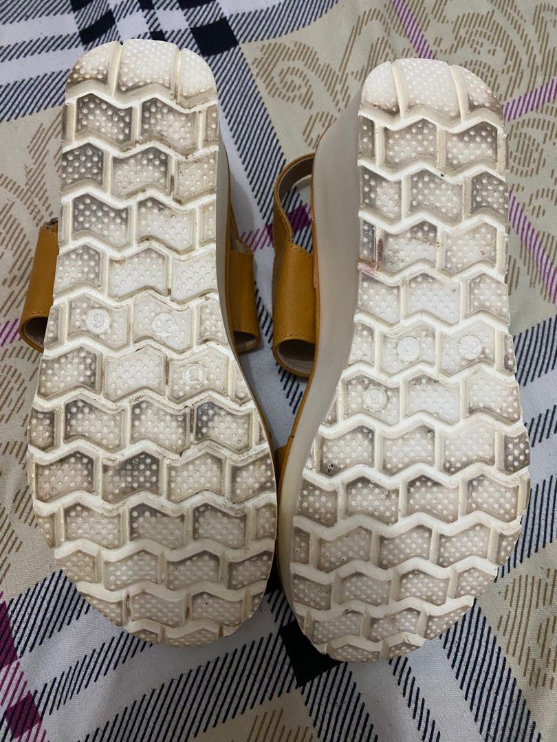 Parisian Wedge Sandals (Category: Flats & Sandals) located in Carmona. Submitted by cheesecake_21 (Listing ID 1398818134, Image 3). Description: - Stylish Parisian wedge sandals - Mustard yellow color - Comfortable strap closure - White wedge sole - Perfect for casual wear - Size not specified -Graduation lang ginamit -799 ang orig na price.