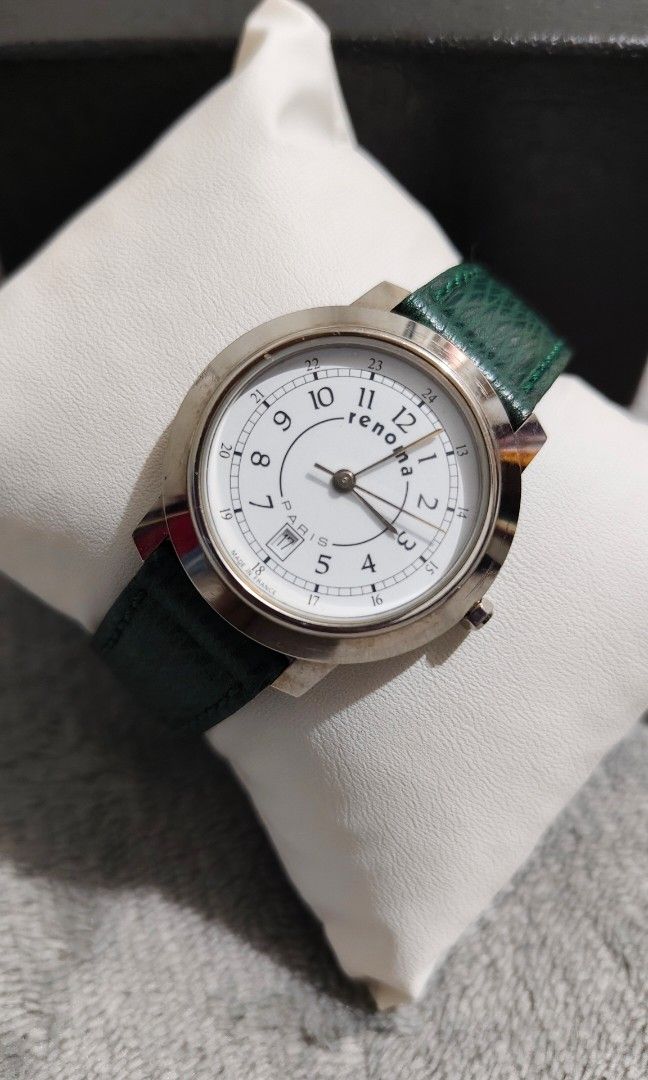 Renoma analog watch vintage (Category: Women's Watches) located in Manila. Submitted by lavishco (Listing ID 1398630755, Image 1). Description: Renoma green strap(orig strap) 8-8.5inches swiss quartz japan water resistant ang class when wornn. with free box location: Olongapo.