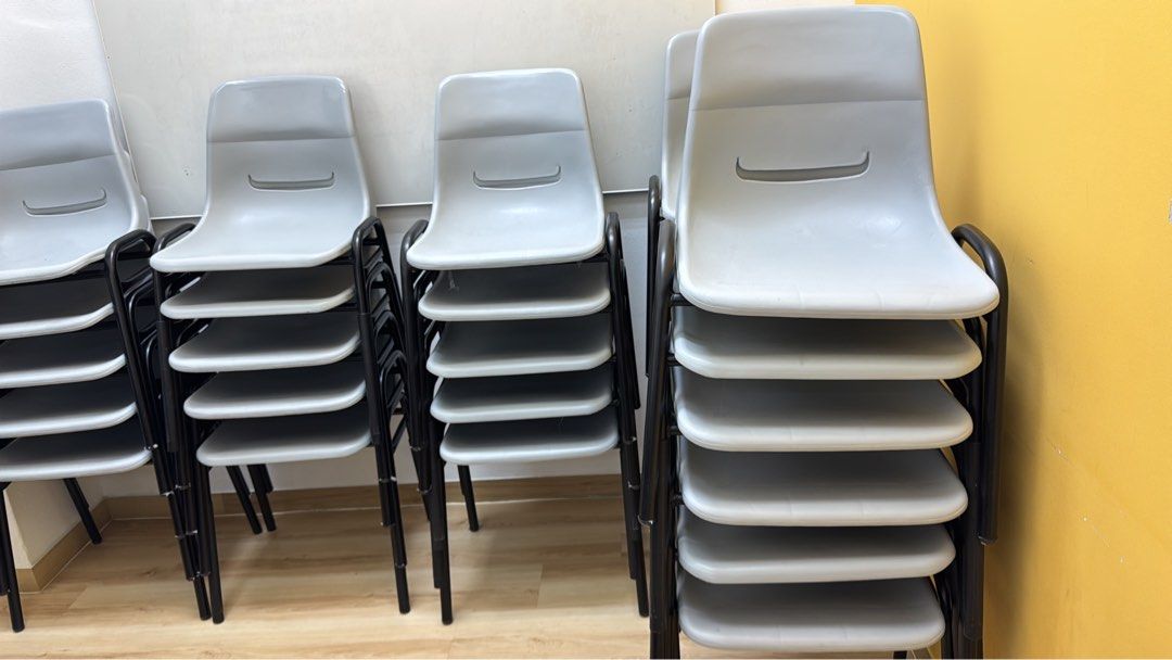 Stackable Grey Chairs (Category: Chairs) located in Singapore. Submitted by wendyyang1982 (Listing ID 1398730227, Image 2). Description: - Stackable grey chairs - Perfect for events or extra seating - Some chairs may have minor wear and tear - Sold as a set - Please inquire for quantity and pricing - Self-collection preferred.
