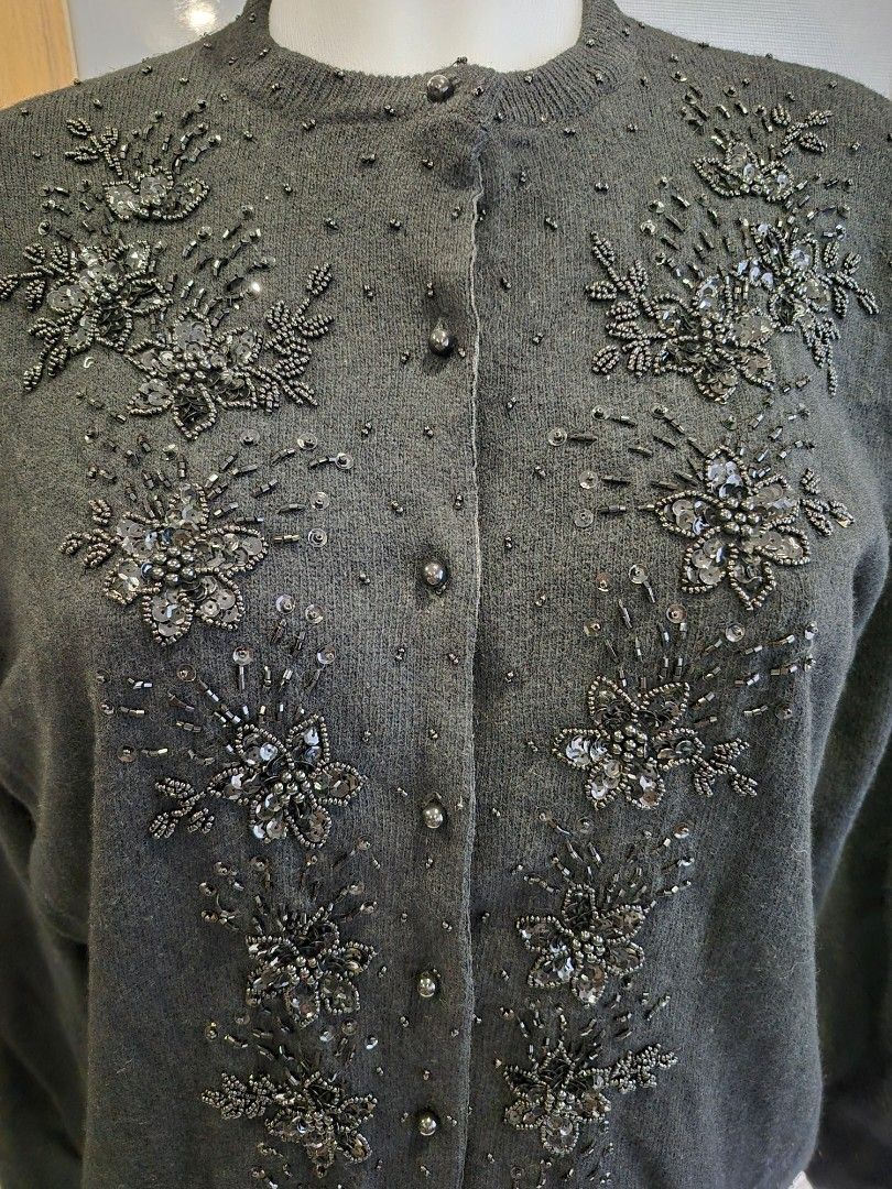 Sweater with hand sewn beads (Category: Coats, Jackets and Outerwear) located in Quezon City. Submitted by soaring7 (Listing ID 1398792806, Image 1). Description: Black sweater with lining. size EU 44, but it seems it's Medium to Large or US 8. .