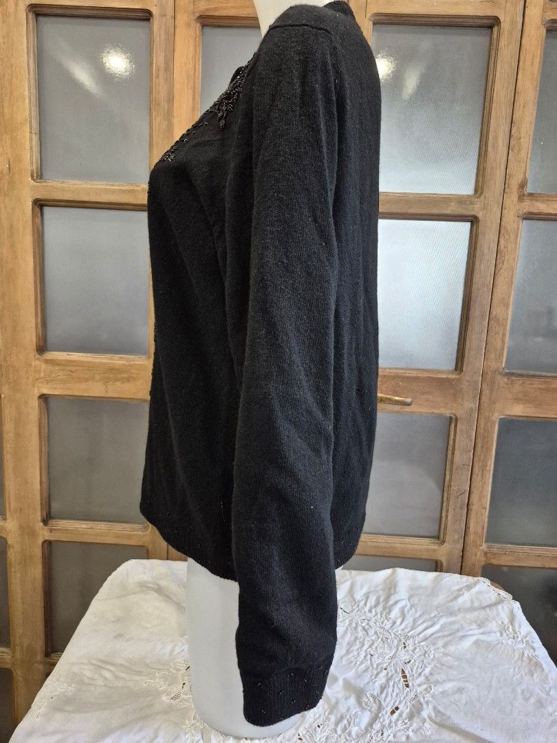 Sweater with hand sewn beads (Category: Coats, Jackets and Outerwear) located in Quezon City. Submitted by soaring7 (Listing ID 1398792806, Image 2). Description: Black sweater with lining. size EU 44, but it seems it's Medium to Large or US 8. .