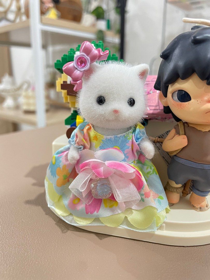 Sylvanian Families White Cat with dress (Category: Figurines & Statues) located in Quezon City. Submitted by babymilkcinnamoroll (Listing ID 1398848823, Image 1). Description: .
