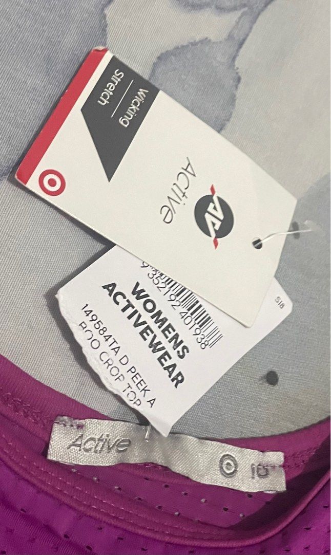 Target Active Women's Crop Top (Category: Activewear) located in Bulacan. Submitted by rjjam14 (Listing ID 1398865710, Image 3). Description: - Target Active sports bra - Size: 10 - Stylish design with mesh overlay - Color: Purple with black band - Women's activewear crop top - Stretch and wicking properties for comfort.