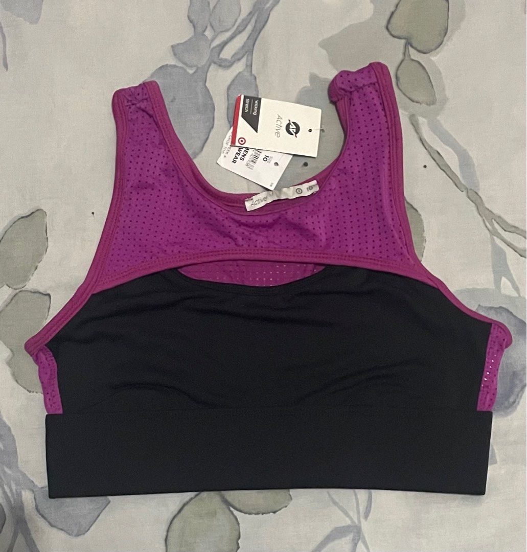 Target Active Women's Crop Top (Category: Activewear) located in Bulacan. Submitted by rjjam14 (Listing ID 1398865710, Image 1). Description: - Target Active sports bra - Size: 10 - Stylish design with mesh overlay - Color: Purple with black band - Women's activewear crop top - Stretch and wicking properties for comfort.