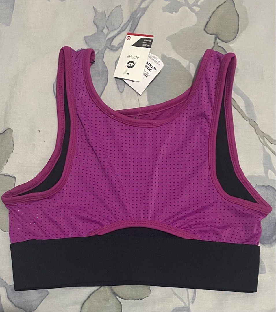 Target Active Women's Crop Top (Category: Activewear) located in Bulacan. Submitted by rjjam14 (Listing ID 1398865710, Image 2). Description: - Target Active sports bra - Size: 10 - Stylish design with mesh overlay - Color: Purple with black band - Women's activewear crop top - Stretch and wicking properties for comfort.
