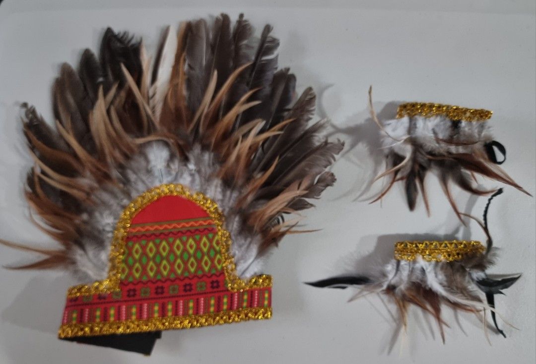 United Nations Costume (Category: Babies & Kids Fashion) located in Makati City. Submitted by PeppermintPanda (Listing ID 1394913107, Image 2). Description: - Complete tribal costume - Includes headdress with feathers, top, skirt, staff, and cuffs - Features intricate patterns - Ideal for United Nations Day - Boasts vibrant colors and an eye-catching design MOP: GCash, Maya, BDO, BPI.