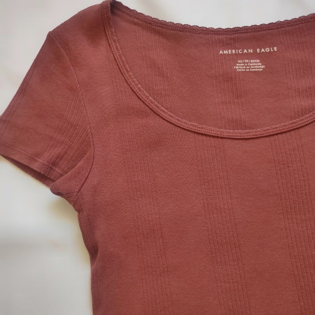 American Eagle Scoop Neck Basic Baby Tee Top | Brandy Melville vibes (Category: Shirts) located in San Pedro. Submitted by moonchld (Listing ID 1398942426, Image 2). Description: Size xs on tag but fits better on small to medium frame.