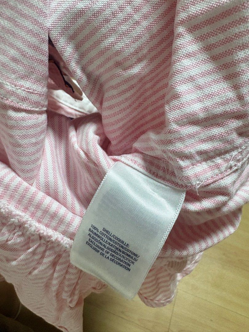 Authentic Ralph Lauren Striped Dress 2T (Category: Babies & Kids Fashion) located in Quezon City. Submitted by griveraa1224 (Listing ID 1398994937, Image 3). Description: - Ralph Lauren dress - Size: 2/2T - Pink and white striped pattern - White collar - Decorative emblem on chest - 100% cotton - Long sleeves .