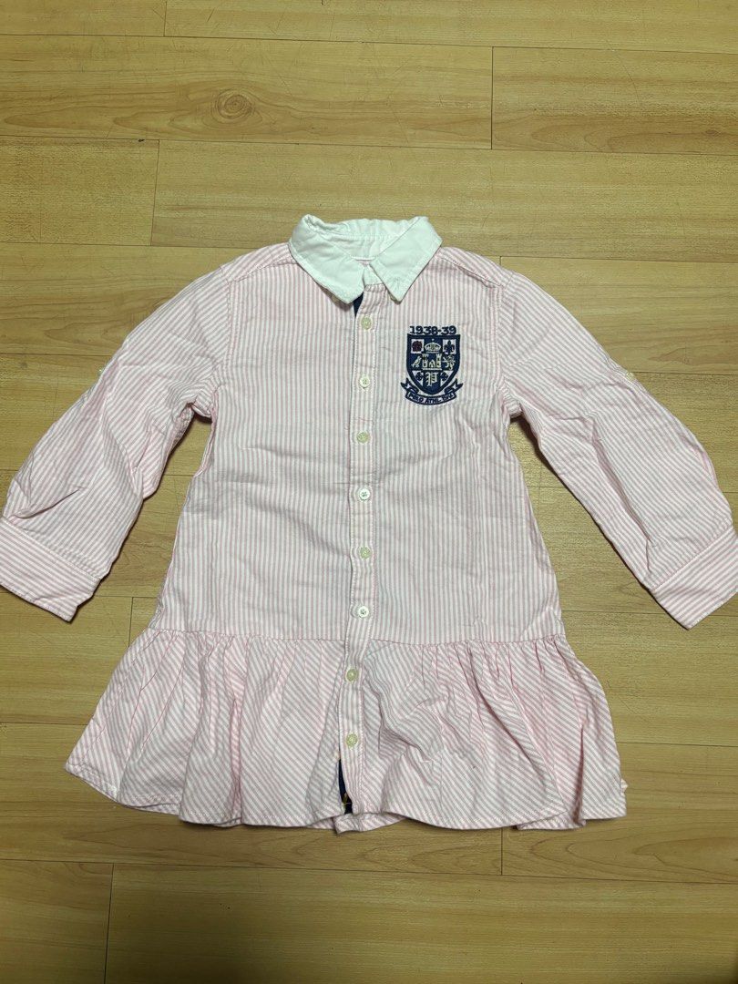 Authentic Ralph Lauren Striped Dress 2T (Category: Babies & Kids Fashion) located in Quezon City. Submitted by griveraa1224 (Listing ID 1398994937, Image 1). Description: - Ralph Lauren dress - Size: 2/2T - Pink and white striped pattern - White collar - Decorative emblem on chest - 100% cotton - Long sleeves .