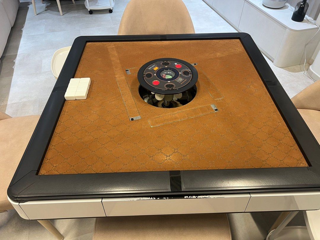 Automatic mahjong table (Category: Interactive Toys) located in Singapore. Submitted by denonsia (Listing ID 1399035293, Image 4). Description: Excellent working condition used mahjong table for sale ! Original price is one k from a local Singapore supplier , not from taobao . Model is gen3 from Funtown . Full table servicing done . Sleek design . The table base has some peeled off paint and drawers with colour discolorations - this is very commo
