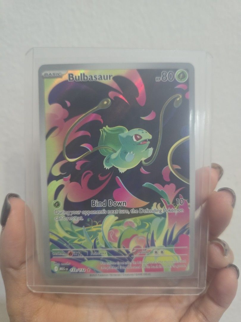 Bulbasaur - Mega Evolution (Category: Raw Cards) located in Singapore. Submitted by bonniebelly319 (Listing ID 1398997231, Image 1). Description: - Bulbasaur SIR -Brand New - just open -Protected in a sleeve Xmas promo! price 25!.