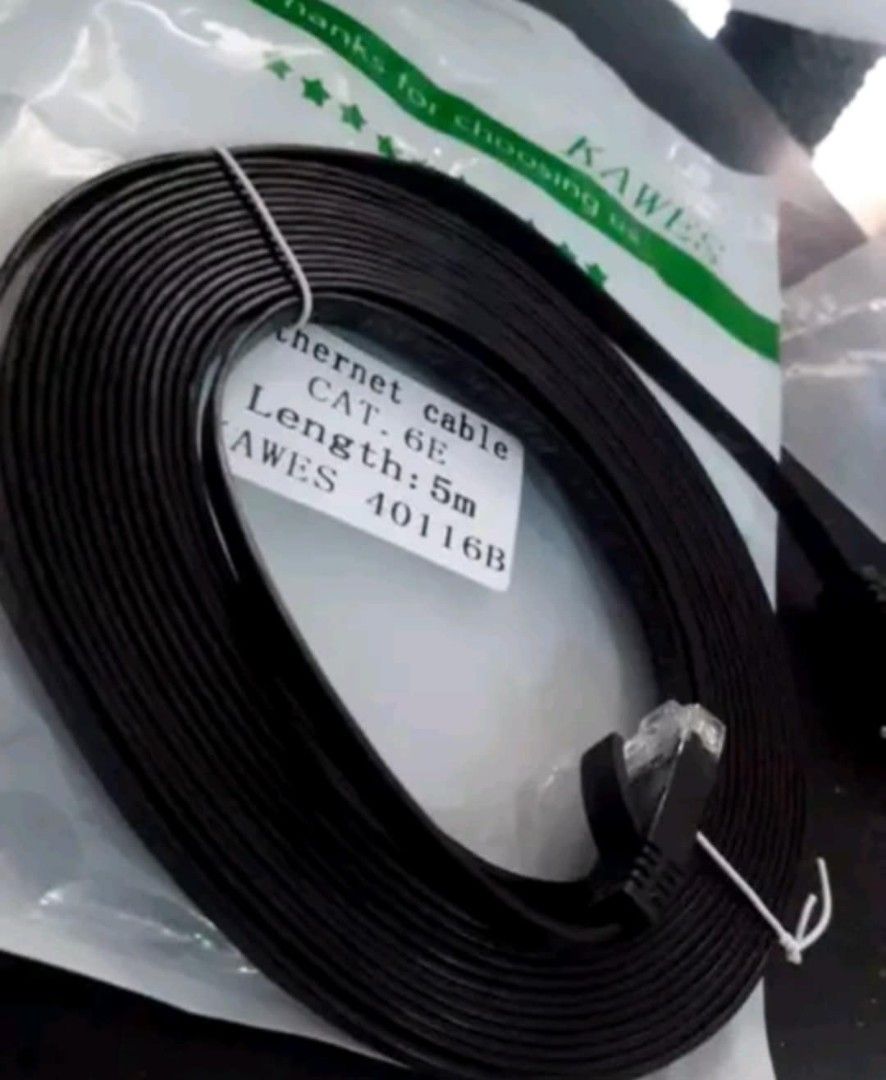 CAT 6 Ethernet Cable 5m/10m (Category: Cables & Adaptors) located in Cebu City. Submitted by gracemarvin06 (Listing ID 1398932681, Image 3). Description: - Flat CAT6 Ethernet Cable - Available Lengths: 5m and 10m - Supports speeds up to 1000Mbps - Color: Black - Perfect for internet connectivity - Comes in original packaging.