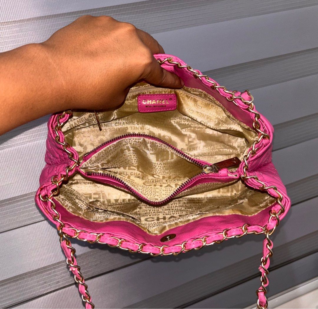 Chanel Pink Quilted Chain Bag (Category: Luxury Bags & Wallets) located in Bago City. Submitted by christiaaan0515 (Listing ID 1398973512, Image 3). Description: - Pink quilted handbag - Floral pattern exterior - Magnetic closure - Interior zip pocket - Excellent condition - Sign of usage only.