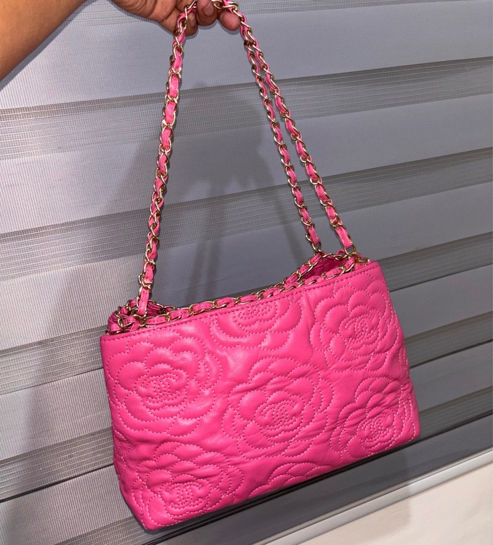 Chanel Pink Quilted Chain Bag (Category: Luxury Bags & Wallets) located in Bago City. Submitted by christiaaan0515 (Listing ID 1398973512, Image 2). Description: - Pink quilted handbag - Floral pattern exterior - Magnetic closure - Interior zip pocket - Excellent condition - Sign of usage only.