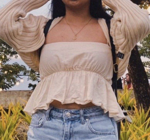Cream-colored Peplum Top (Category: Sleeveless) located in Rizal. Submitted by preluvjay (Listing ID 1398881185, Image 2). Description: - Cream-colored top - Square neckline - Peplum design - Thin straps - Gathered detail under bust - Smooth, satin-like material - Versatile styling options.