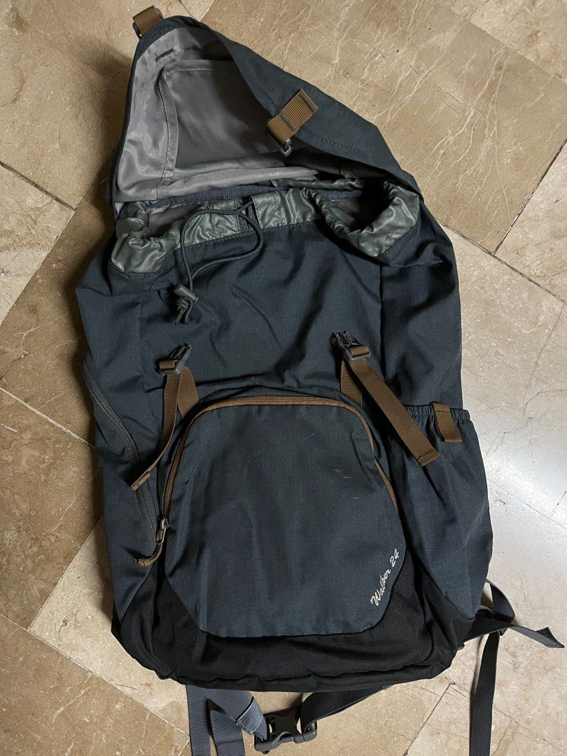 Deuter Walker 24 Backpack (Category: Backpacks) located in Binangonan. Submitted by lv33852 (Listing ID 1398893724, Image 3). Description: - Deuter Walker 24 backpack - Color: Dark Grey - Main compartment with drawstring closure - Front pocket - Side pockets - Deuter Airstripes back system for ventilation - Adjustable shoulder straps and buckles - Deuter logo visible.