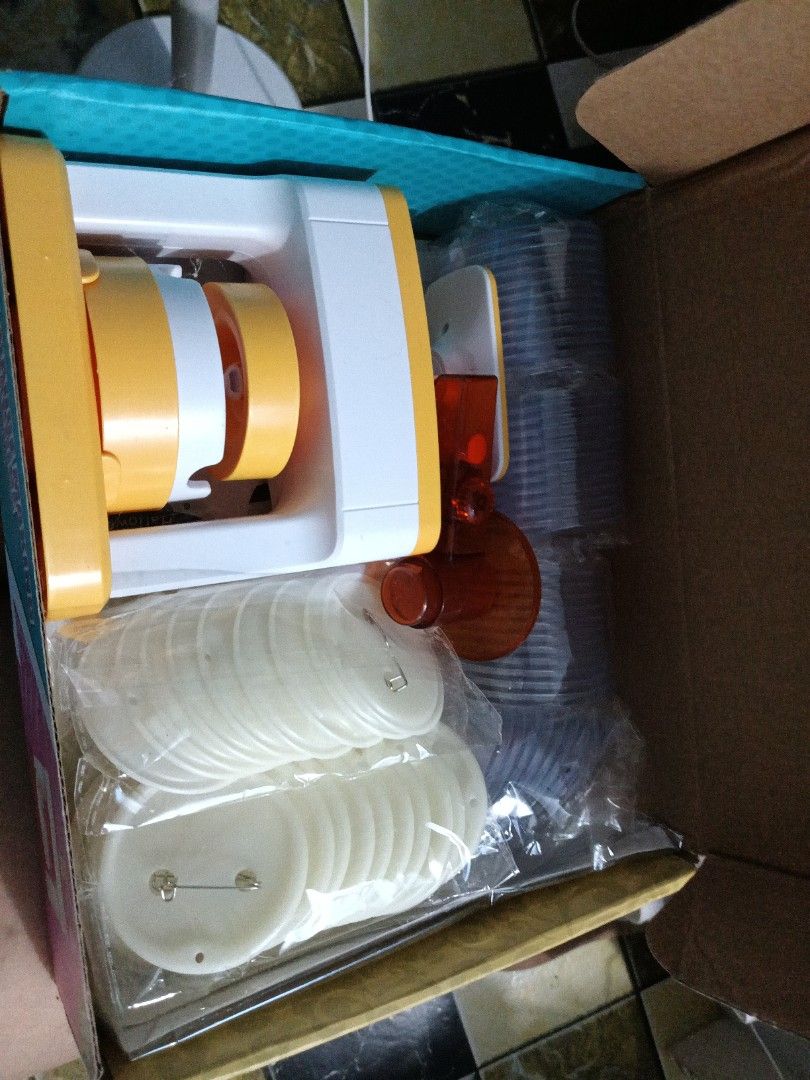 DIY Badge Making Machine (Category: Craft Supplies & Tools) located in Daraga. Submitted by declutter.with_me (Listing ID 1399012354, Image 3). Description: Can pass brandnew, triny lang 3pcs. REPRICED FROM 999 - DIY Badge Making Machine Set - Includes machine, badge components, and instructions - Suitable for ages 6+ - Perfect for crafting and personalized gifts - Complete set, ready to use.